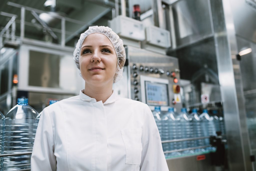 Young woman factory worker